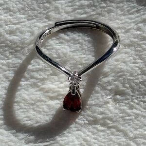 Pear cut Red Garnet with Diamond accent set in an adjustable 925 Sterling Silver